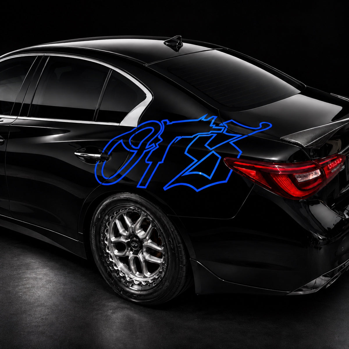 Blue OTS 40-inch vinyl decal on car