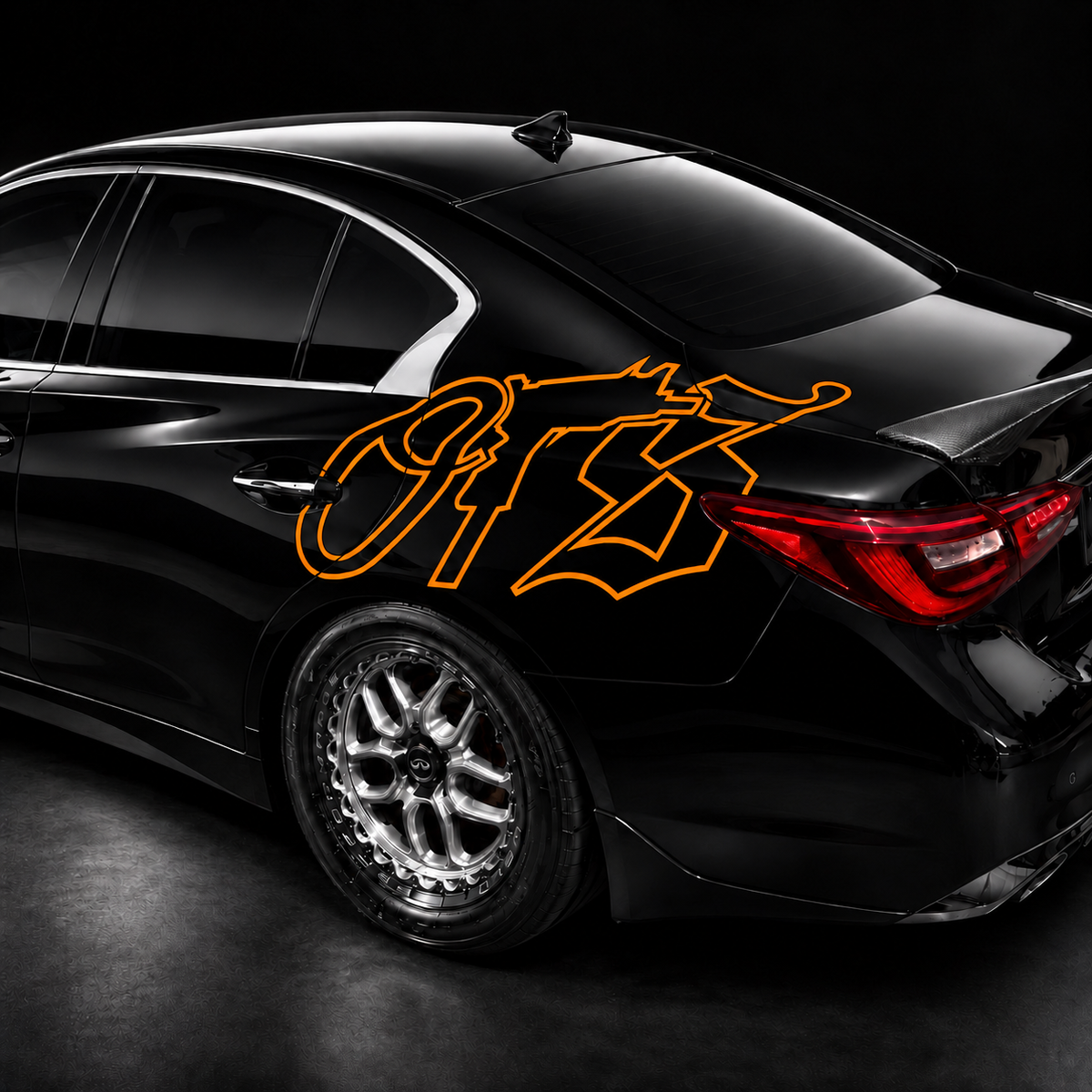Orange OTS 40-inch vinyl decal on black car