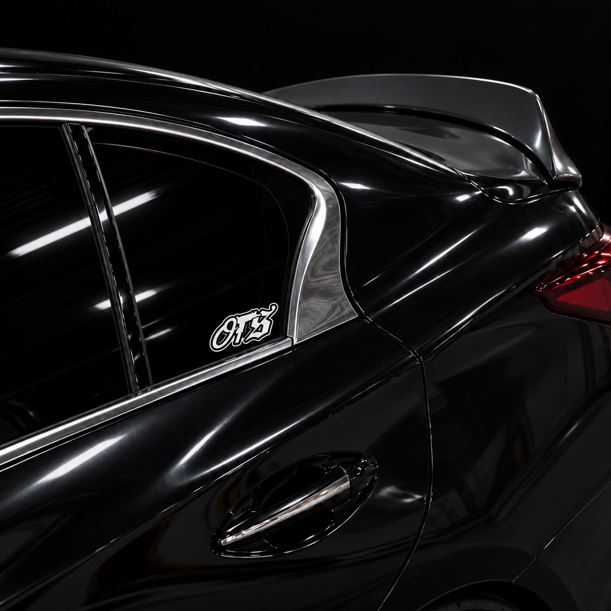 OTS Black Outline Sticker on a black car rear side window