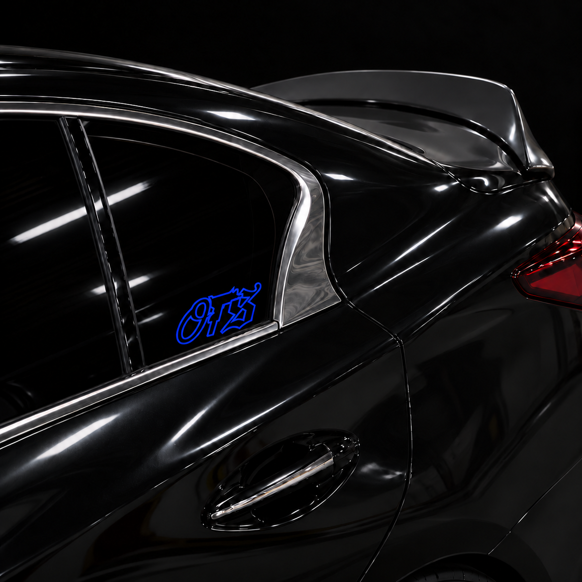 Blue OTS 6 x 2.5 inch outline vinyl, no fill, on a black car side window