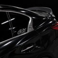White OTS 6 x 2.5 inch outline vinyl, no fill, on a black car side window