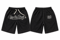 OTS black shorts with silver logo, front and back on white background